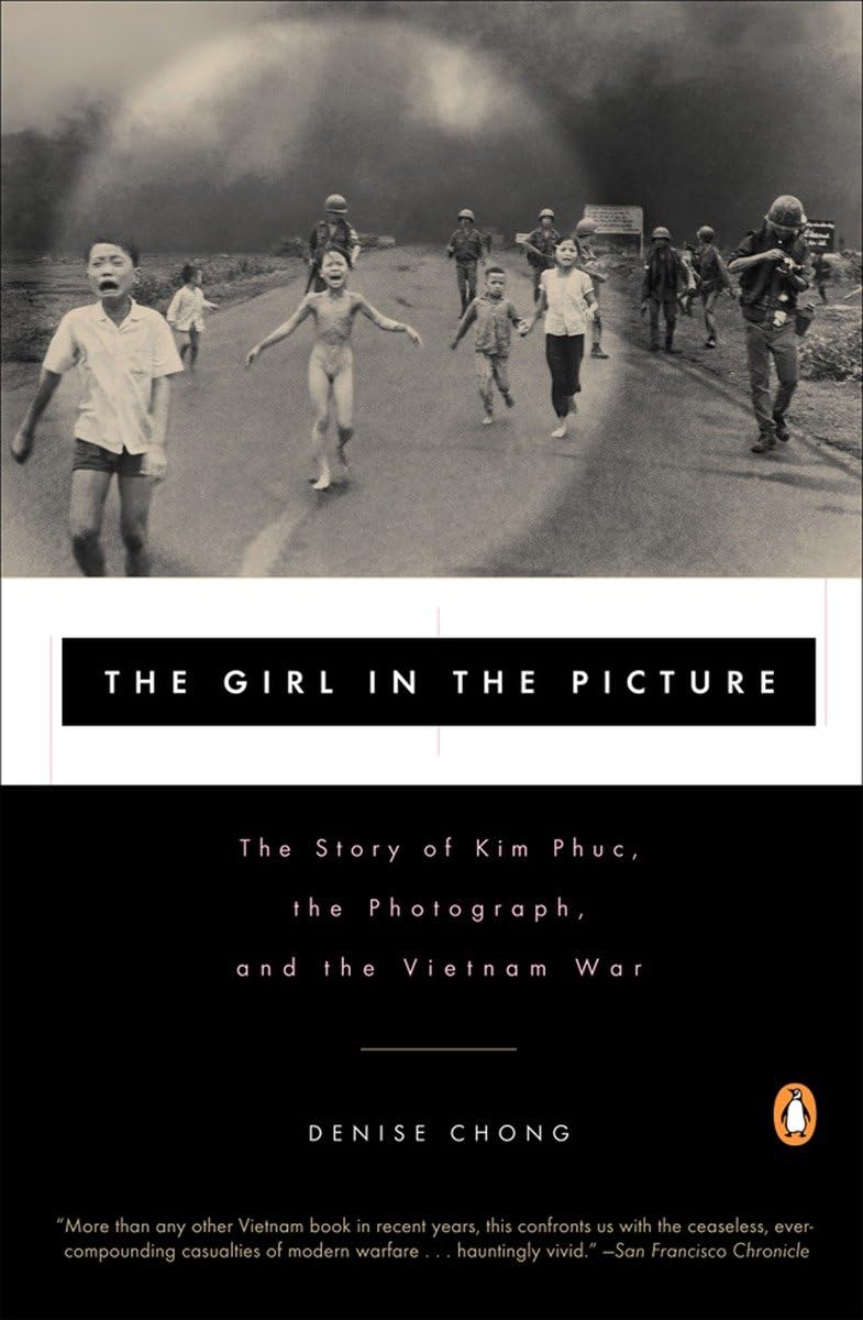 The Girl in the Picture: The Story of Kim Phuc, the Photograph, and the Vietnam War [Paperback] Chong, Denise