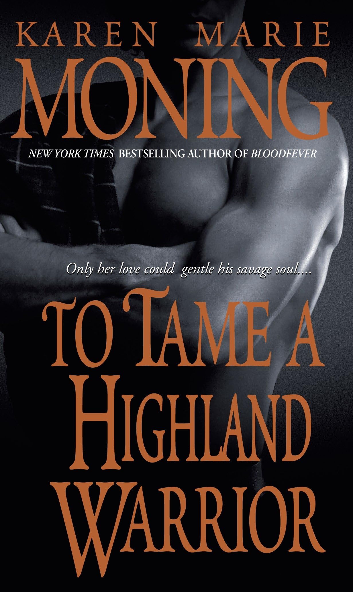 To Tame a Highland Warrior: 2 [Mass Market Paperback] Moning, Karen Marie