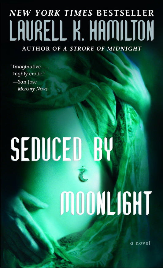 Seduced by Moonlight: 3 [Mass Market Paperback] Hamilton, Laurell K