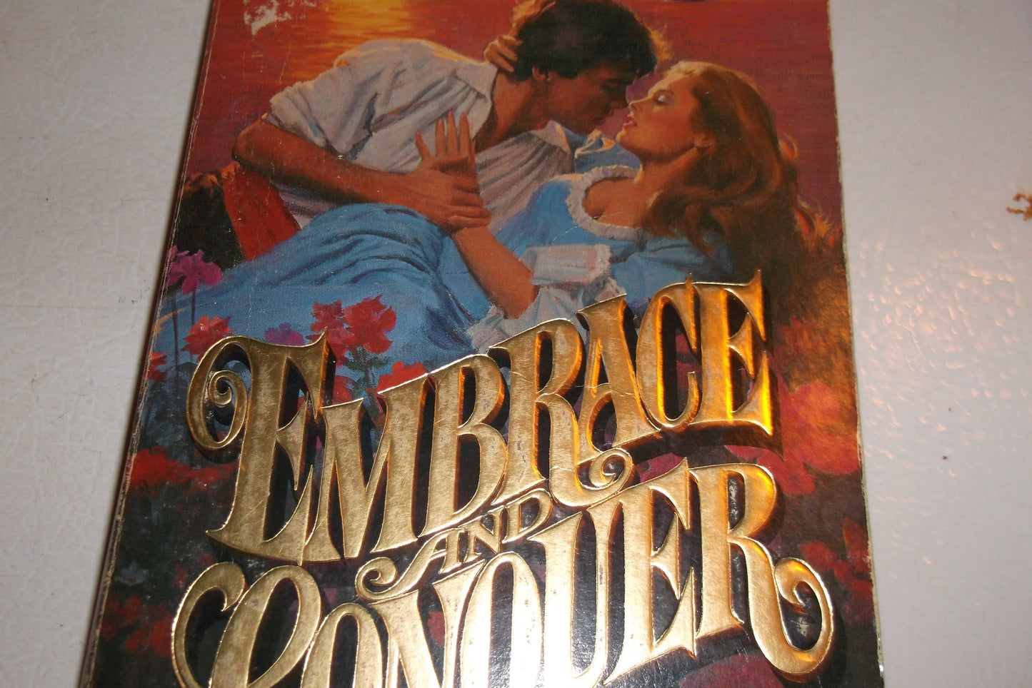 EMBRACE AND CONQUER [Paperback]